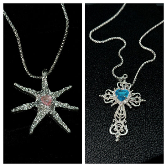 Spiked Starfish & Filigree Cross Heart Necklace Set on mannequin bust, front view close-up