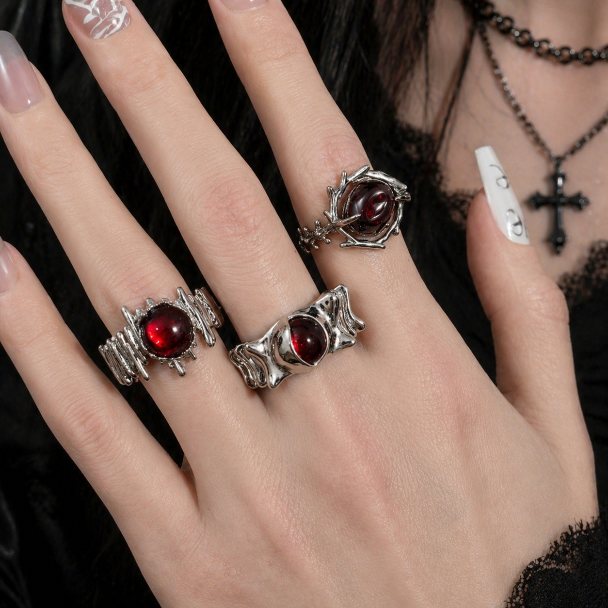 Red Cabochon Dark Silver Ring Set in open black velvet jewelry box, angled view