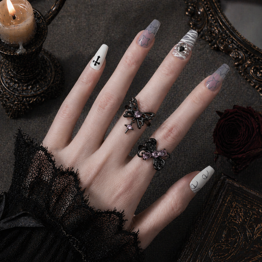 Pink Flutter Duo Adjustable Butterfly Heart & Crystal Stacking Rings worn on finger, dark moody background – Aslop Treasure