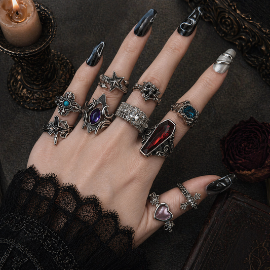 Gothic Romance Aesthetic Ring Collection worn on finger, dark moody background – Aslop Treasure