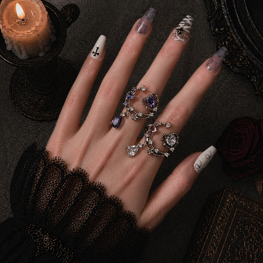 Heart Drop Chain Ring worn on finger, dark moody background – Aslop Treasure