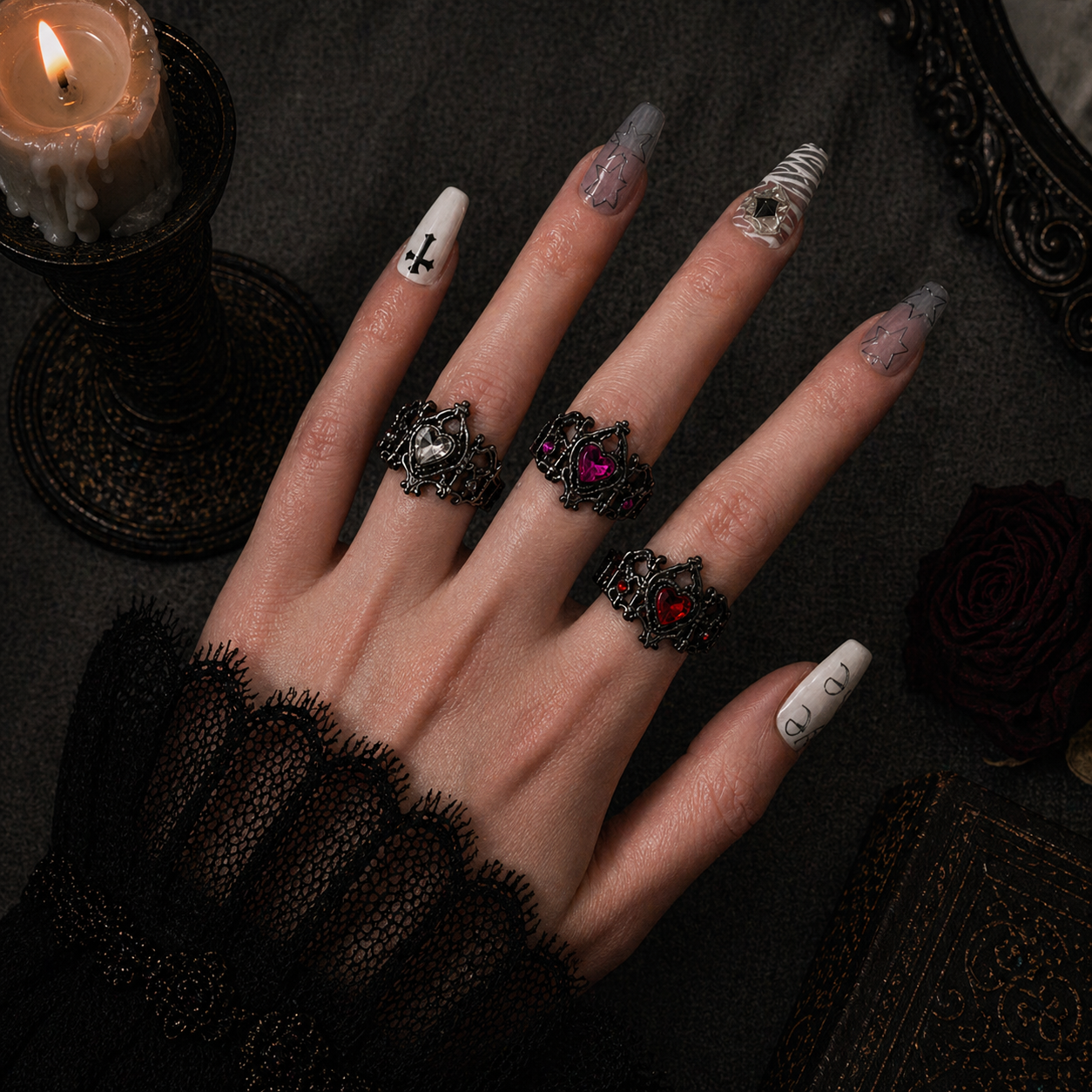 Gothic Heart Crown Ring worn on finger, dark moody background – Aslop Treasure