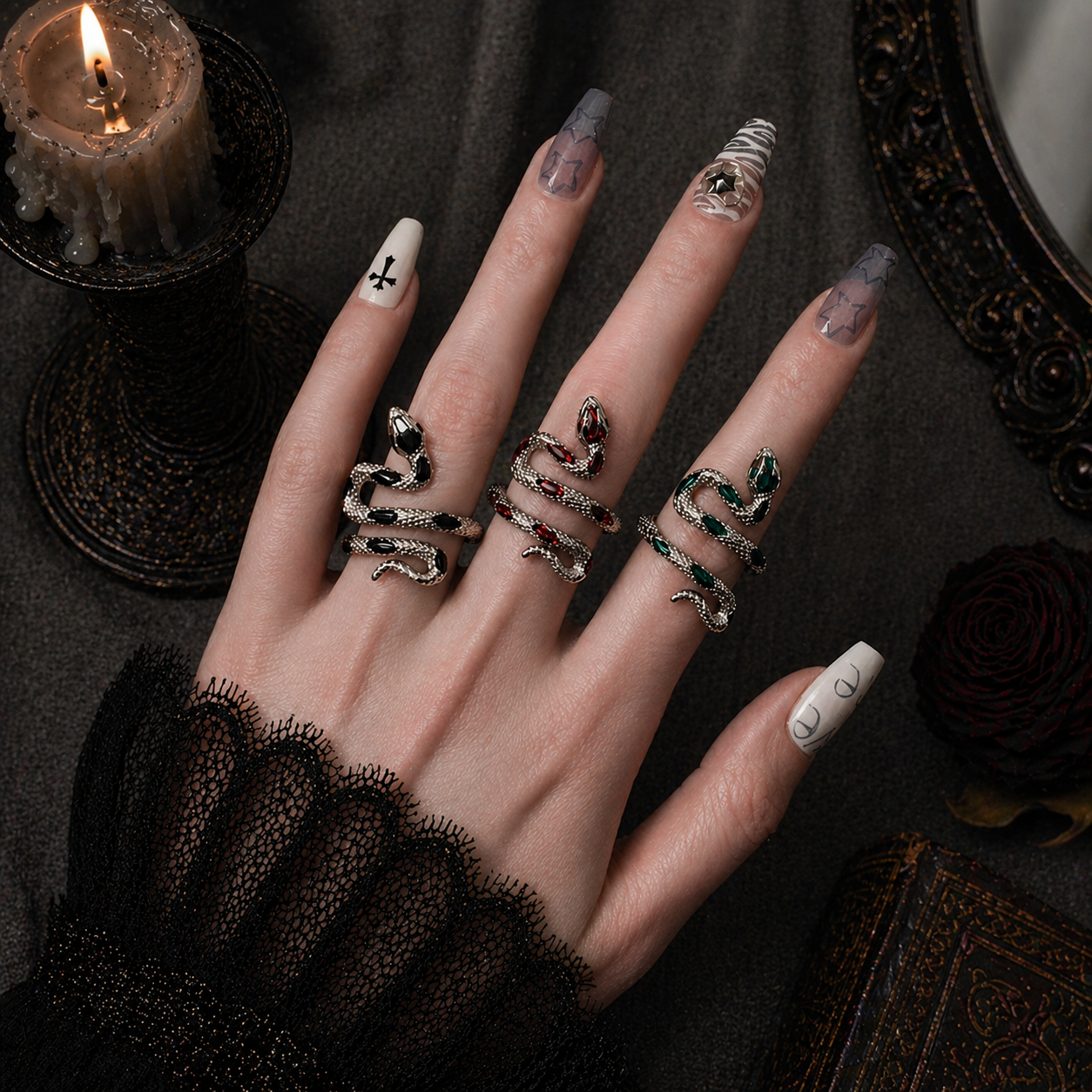 Coiled Snake Ring worn on finger, dark moody background – Aslop Treasure