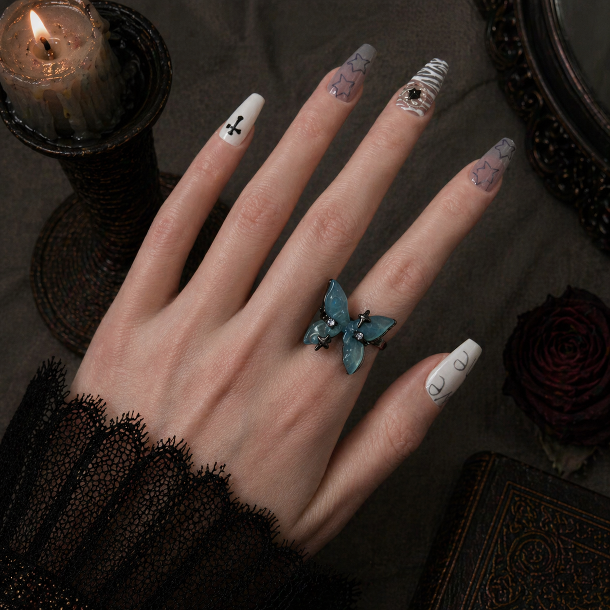Blue Butterfly Resin Ring worn on finger, dark moody background – Aslop Treasure