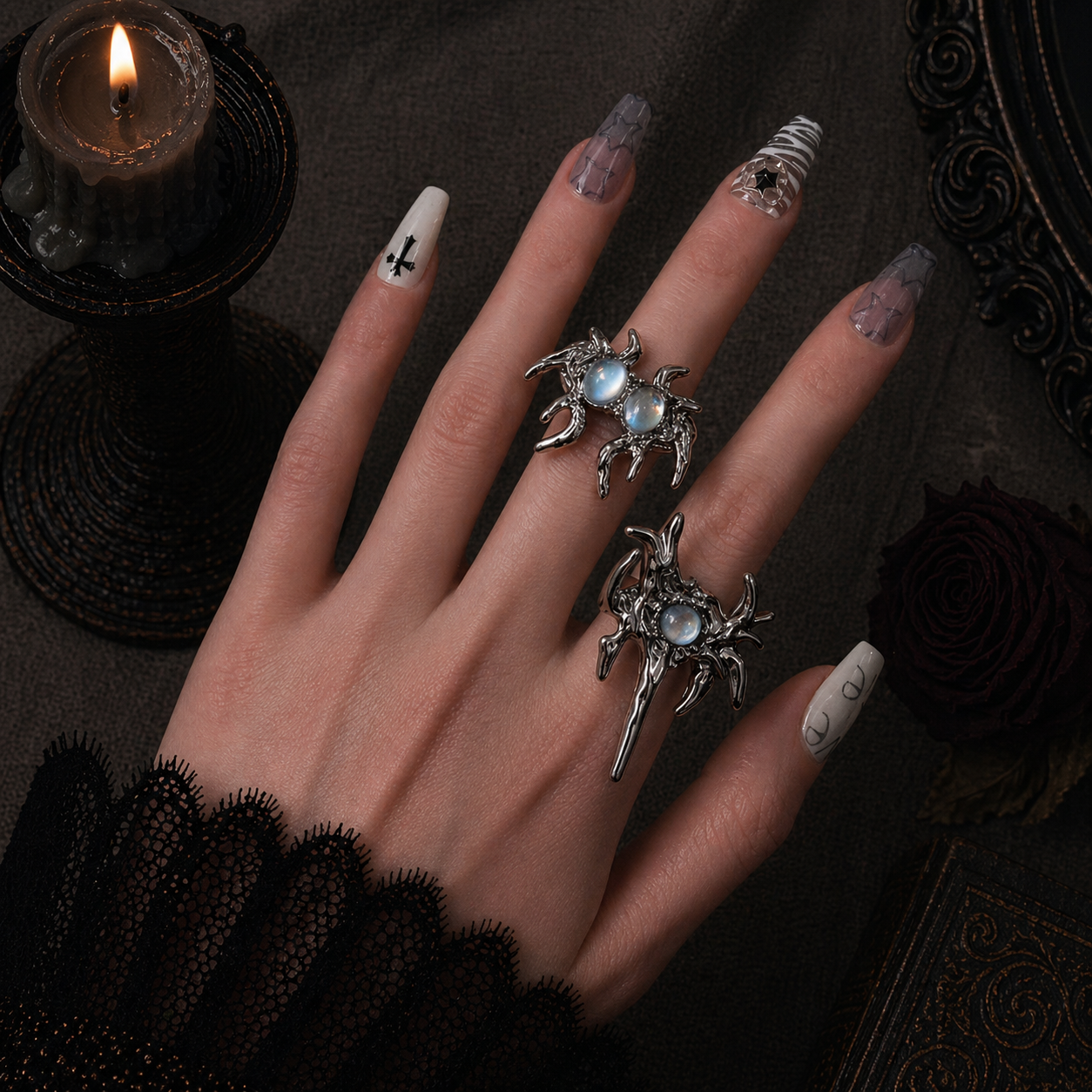Monster Ring worn on finger, dark moody background – Aslop Treasure