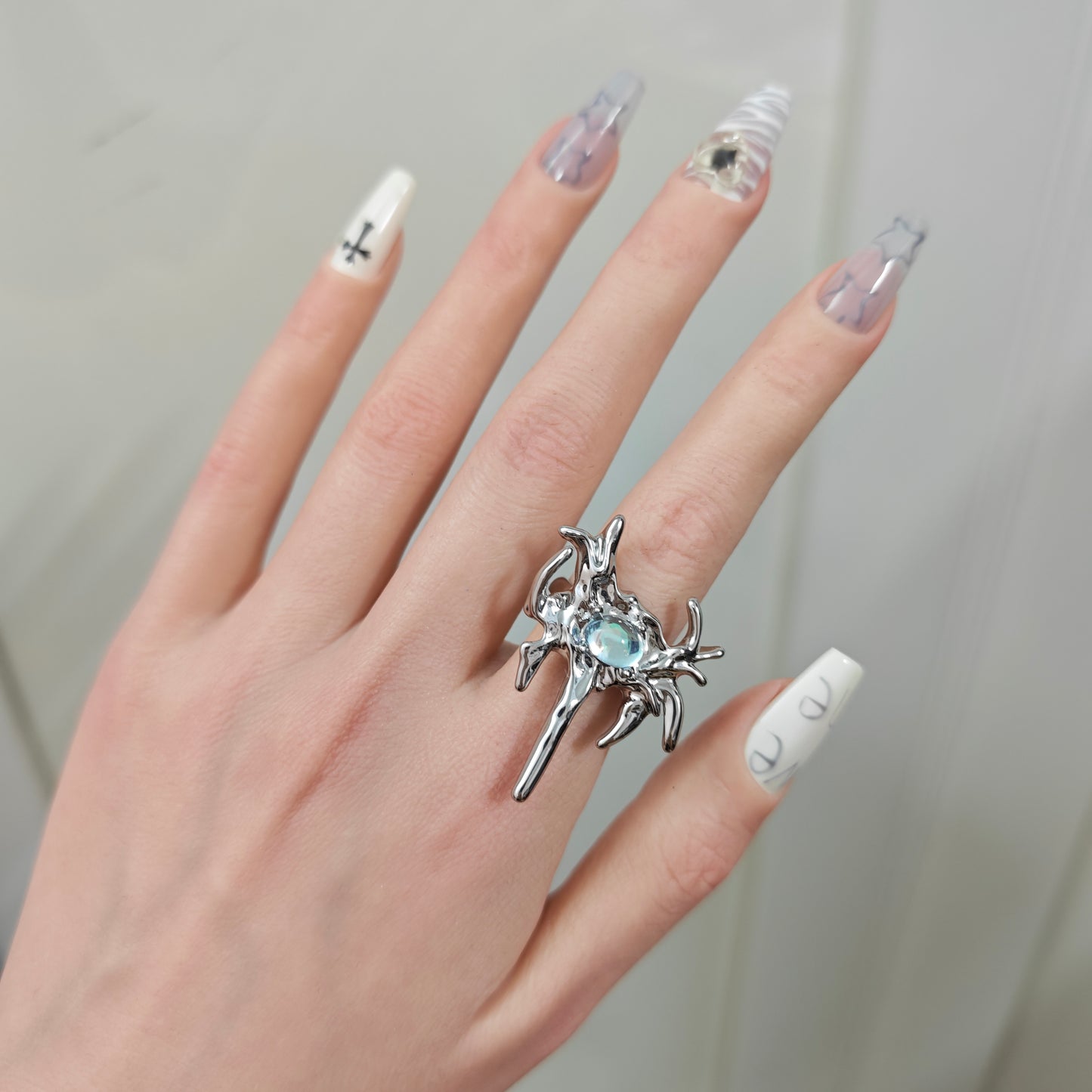 Monster Ring in open Aslop Jewelry white gift box, angled view