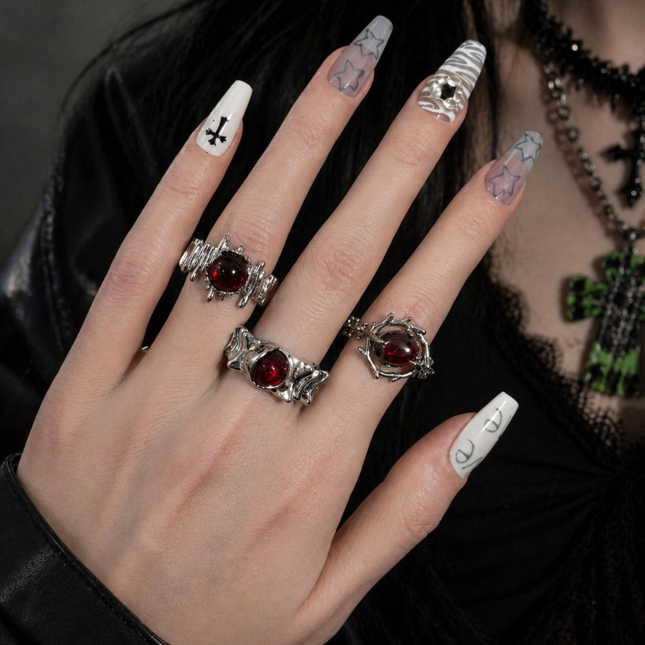 Red Cabochon Dark Silver Ring Set on black mannequin hand, front view close-up