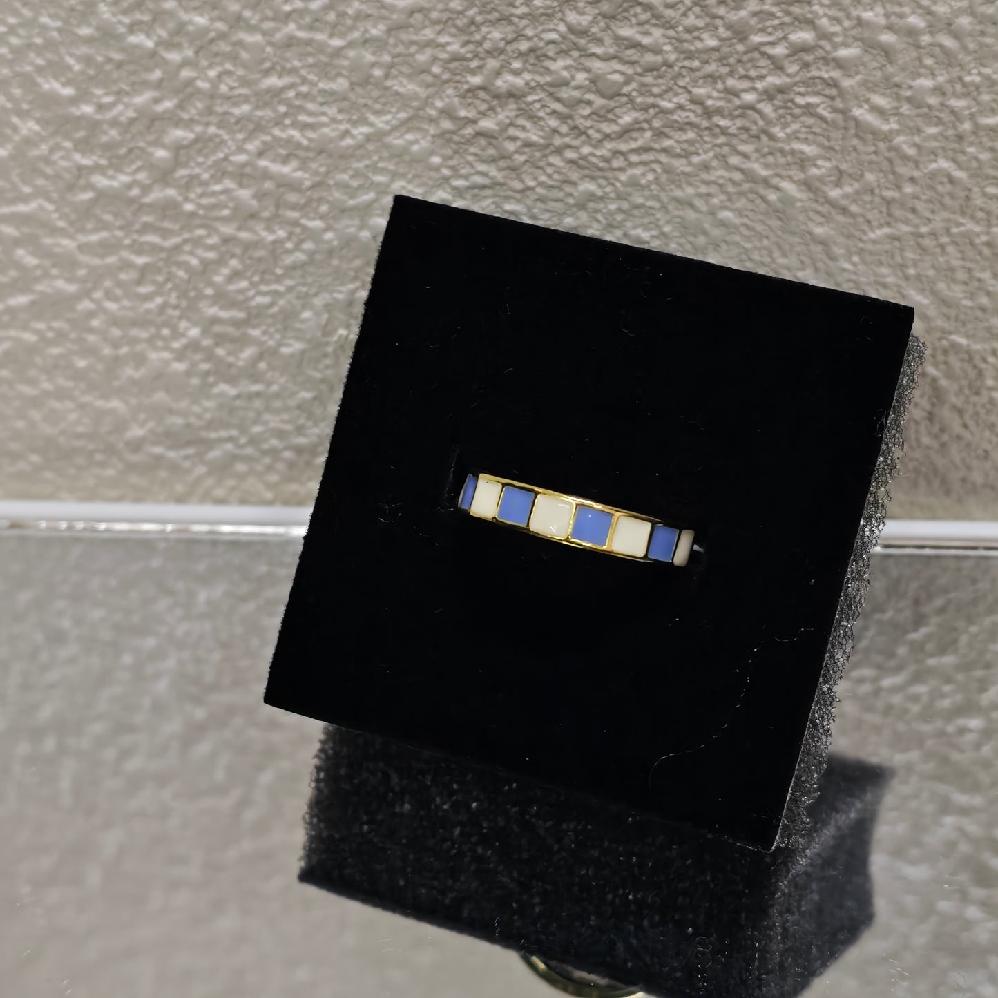 blue white checkerboard ring gold y2k style