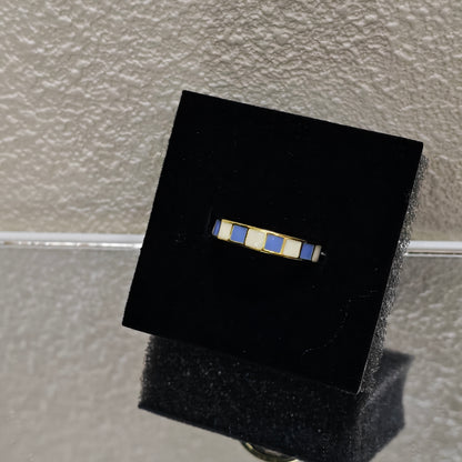 blue white checkerboard ring gold y2k style