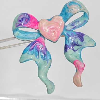 Copper enamel bow ring heart detail top view