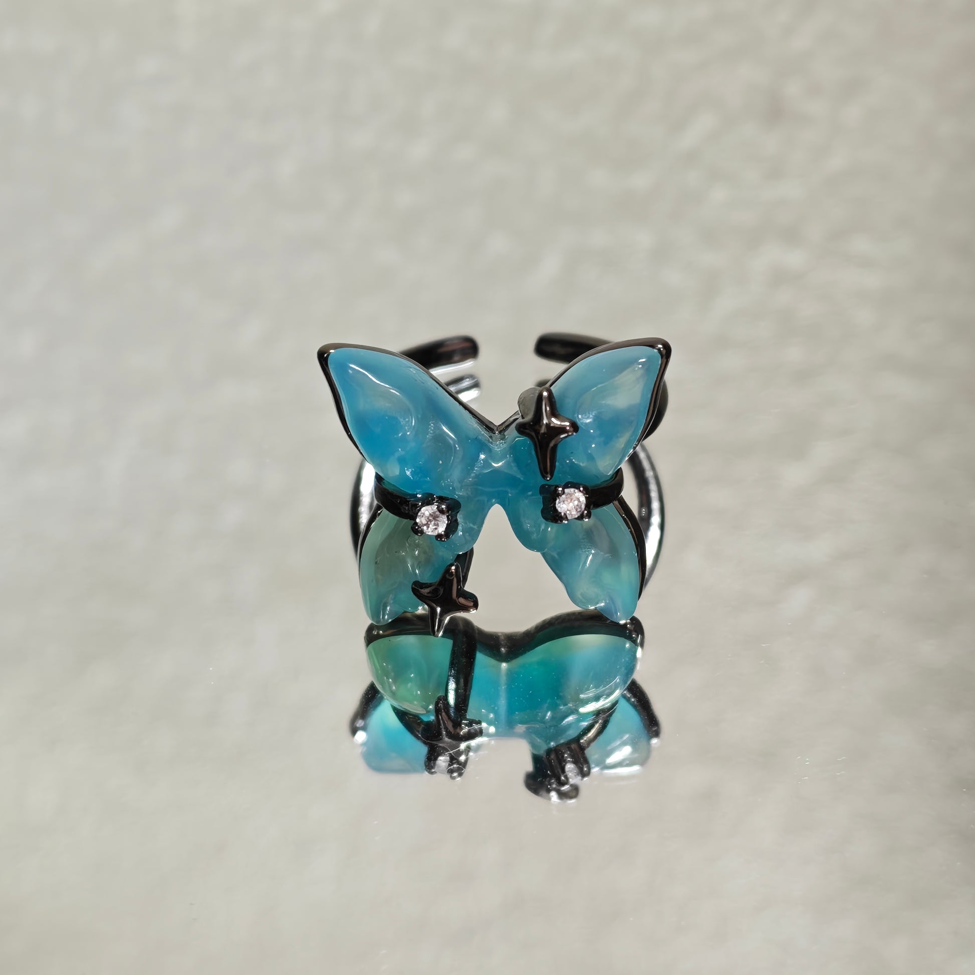 blue butterfly ring dark cottagecore style