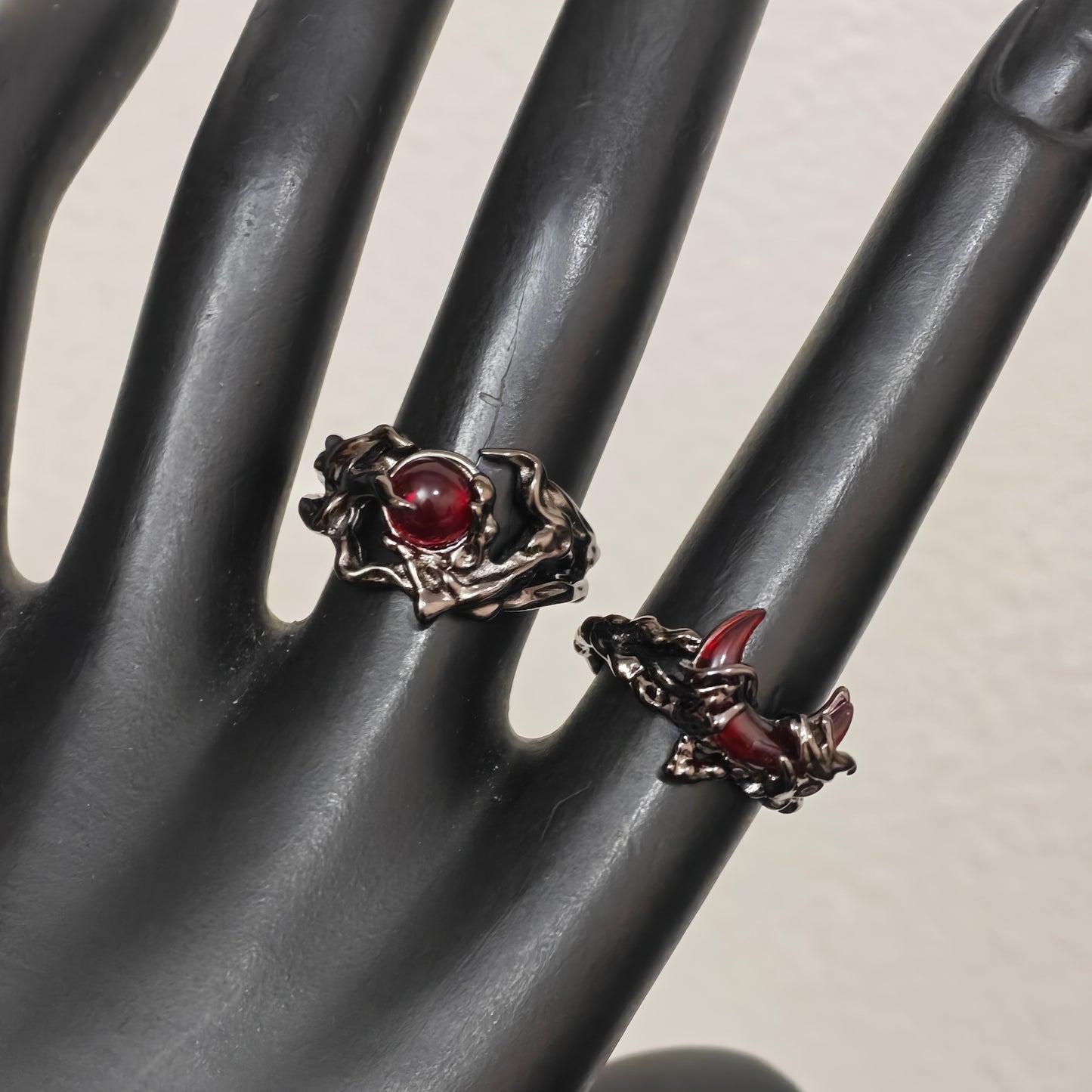 Adjustable gunmetal gothic rings close up