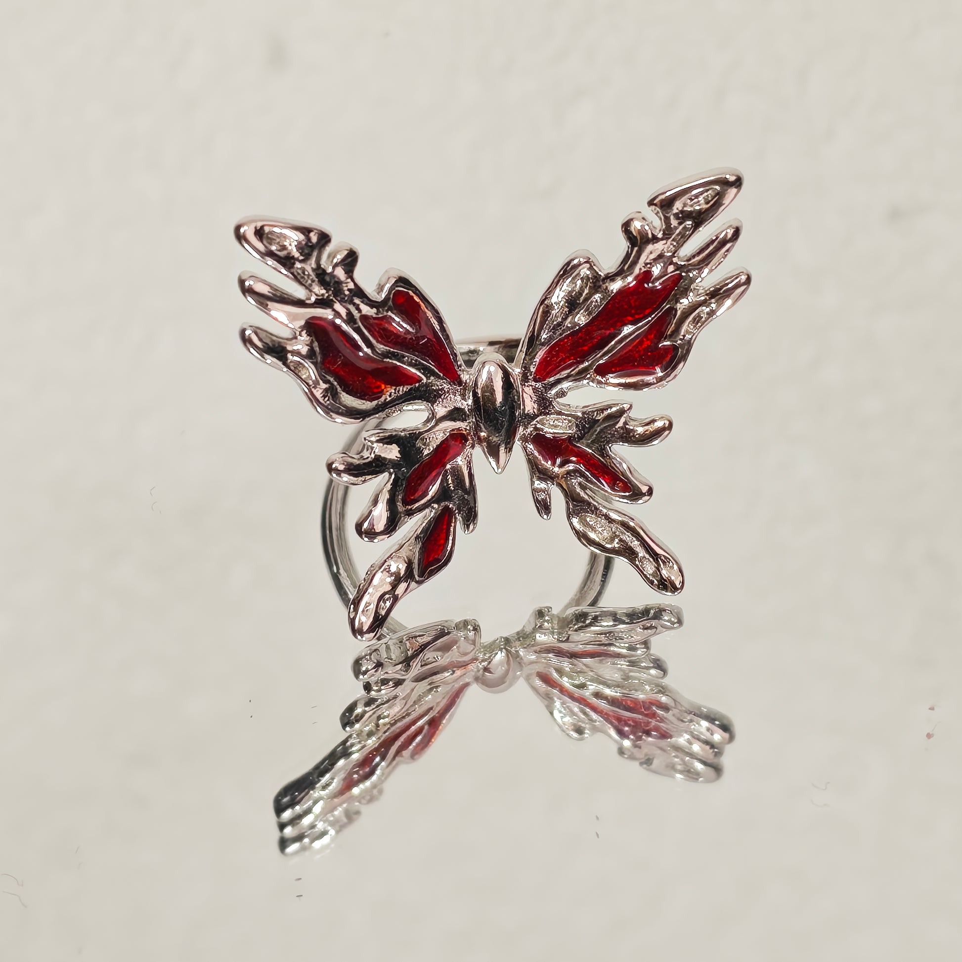 Red and silver butterfly ring zircon detail