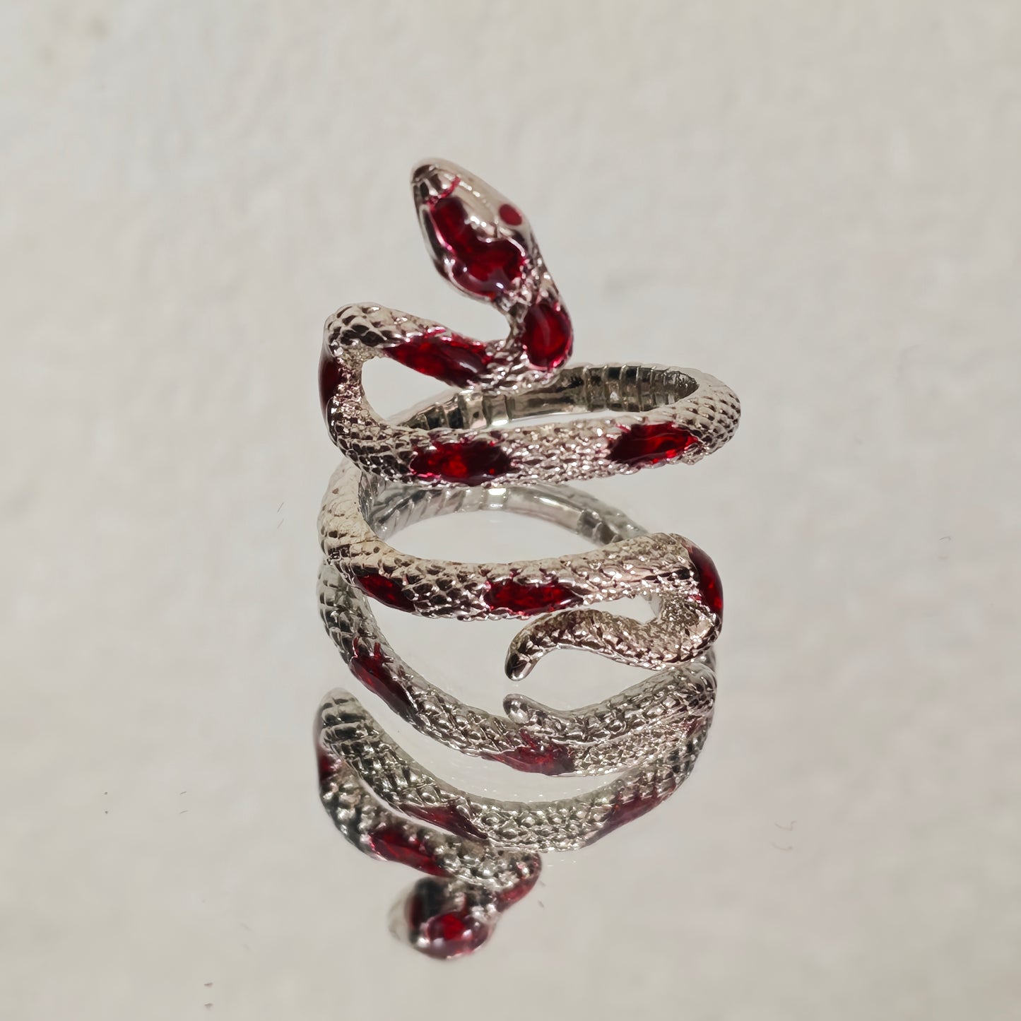 Dark aesthetic snake statement ring red and silver