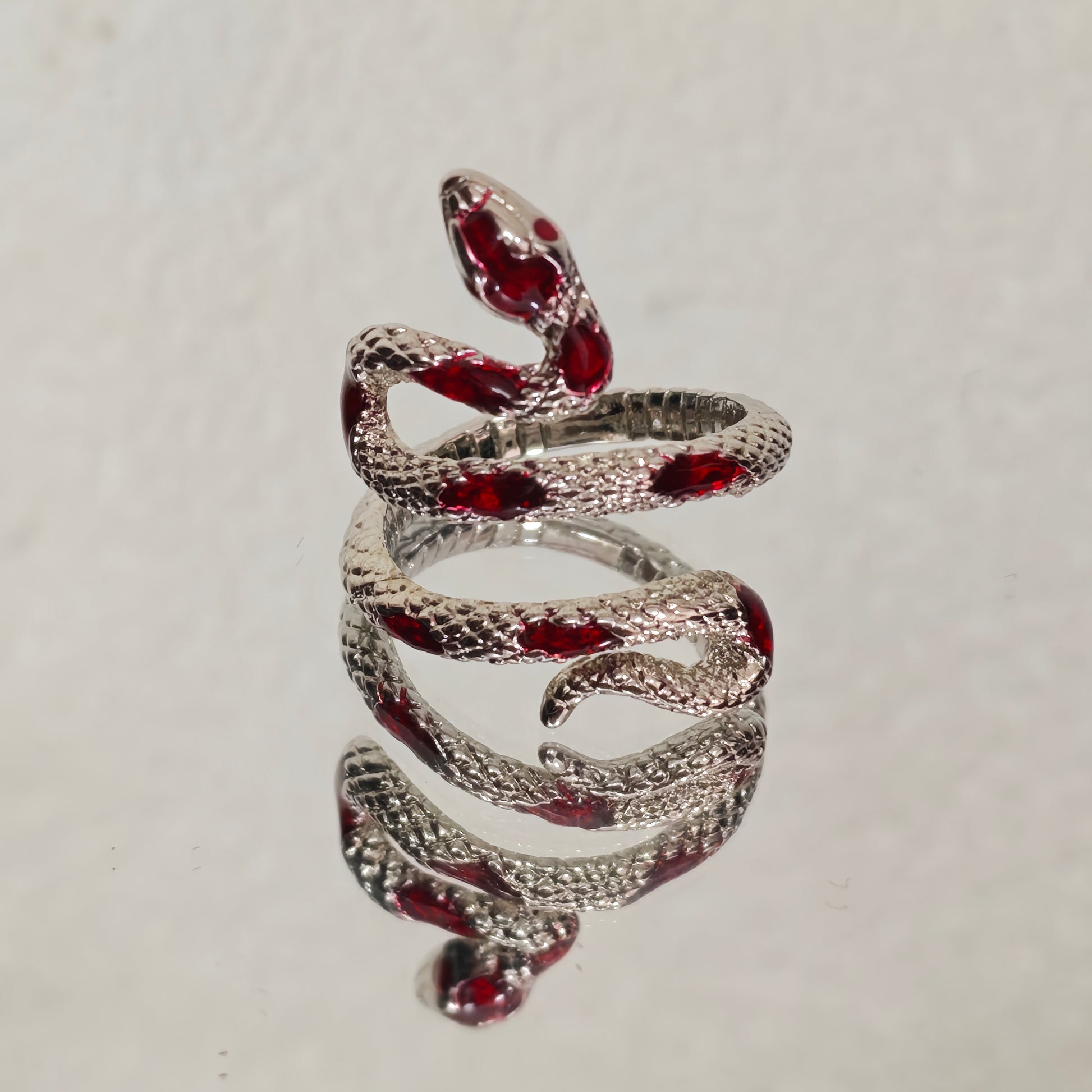 Dark aesthetic snake statement ring red and silver