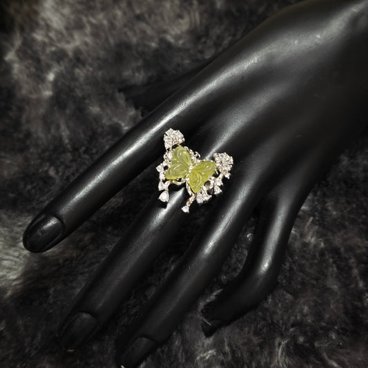 Adjustable silver ring with carved green butterfly and zircon stones