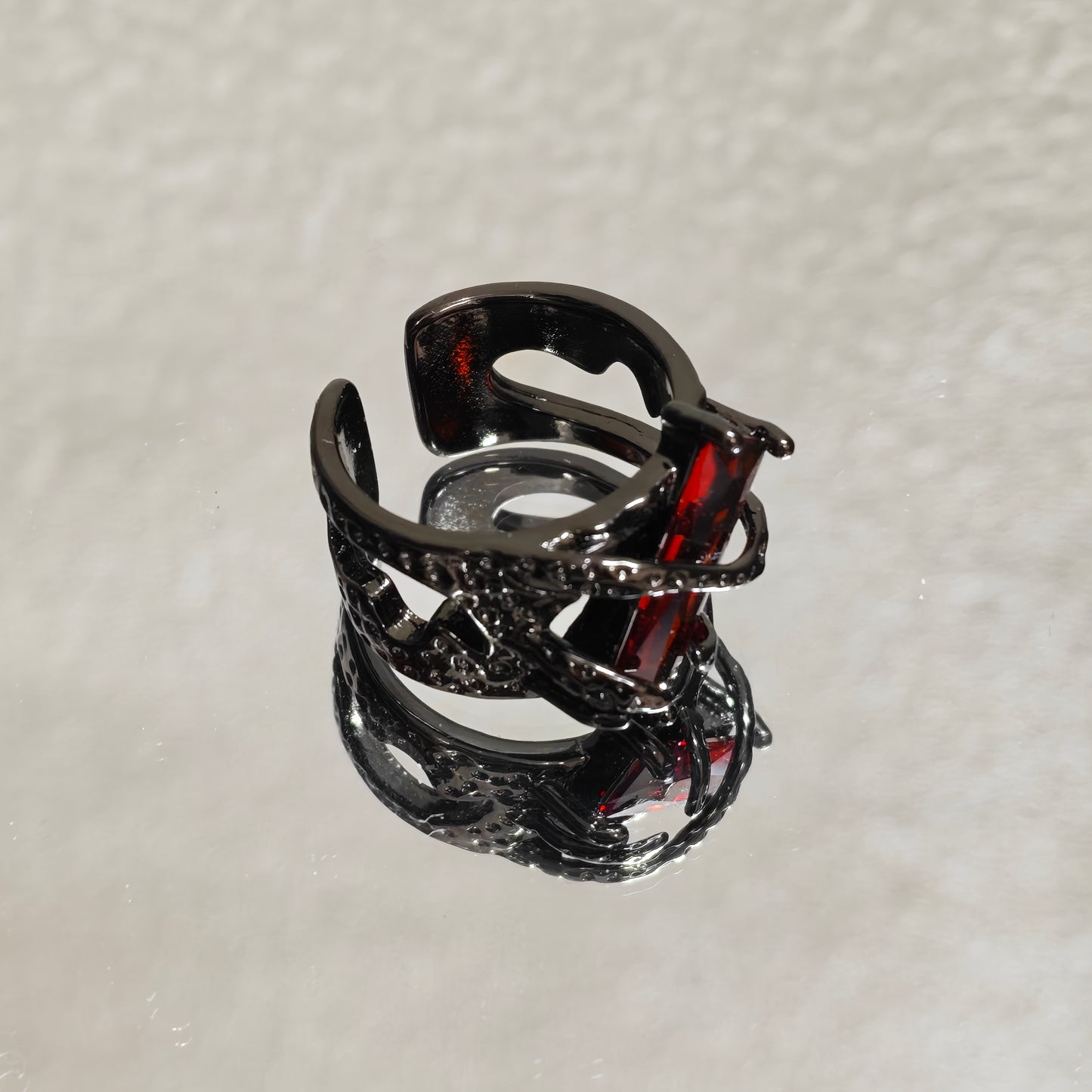 red stone statement ring edgy dark aesthetic