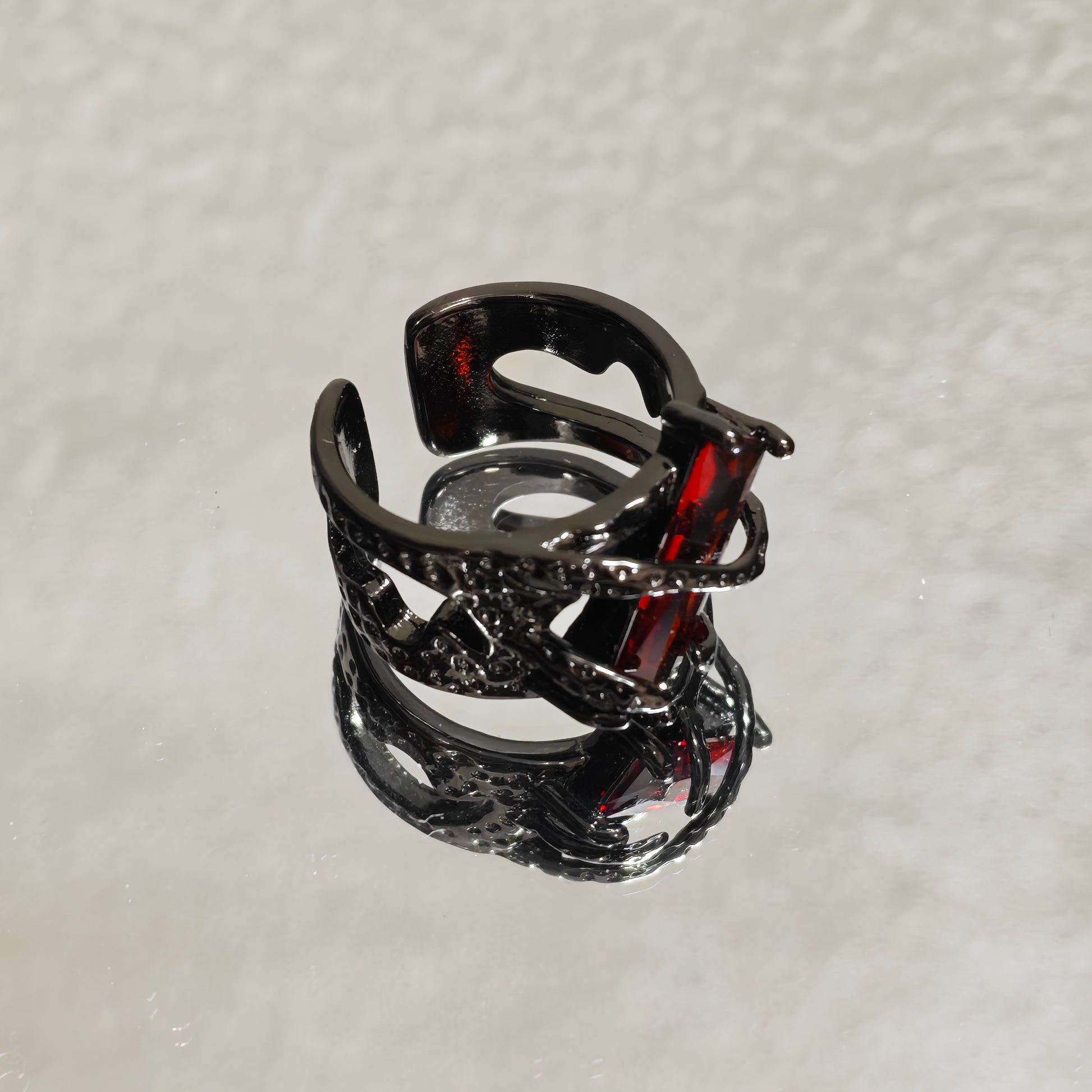 red stone statement ring edgy dark aesthetic
