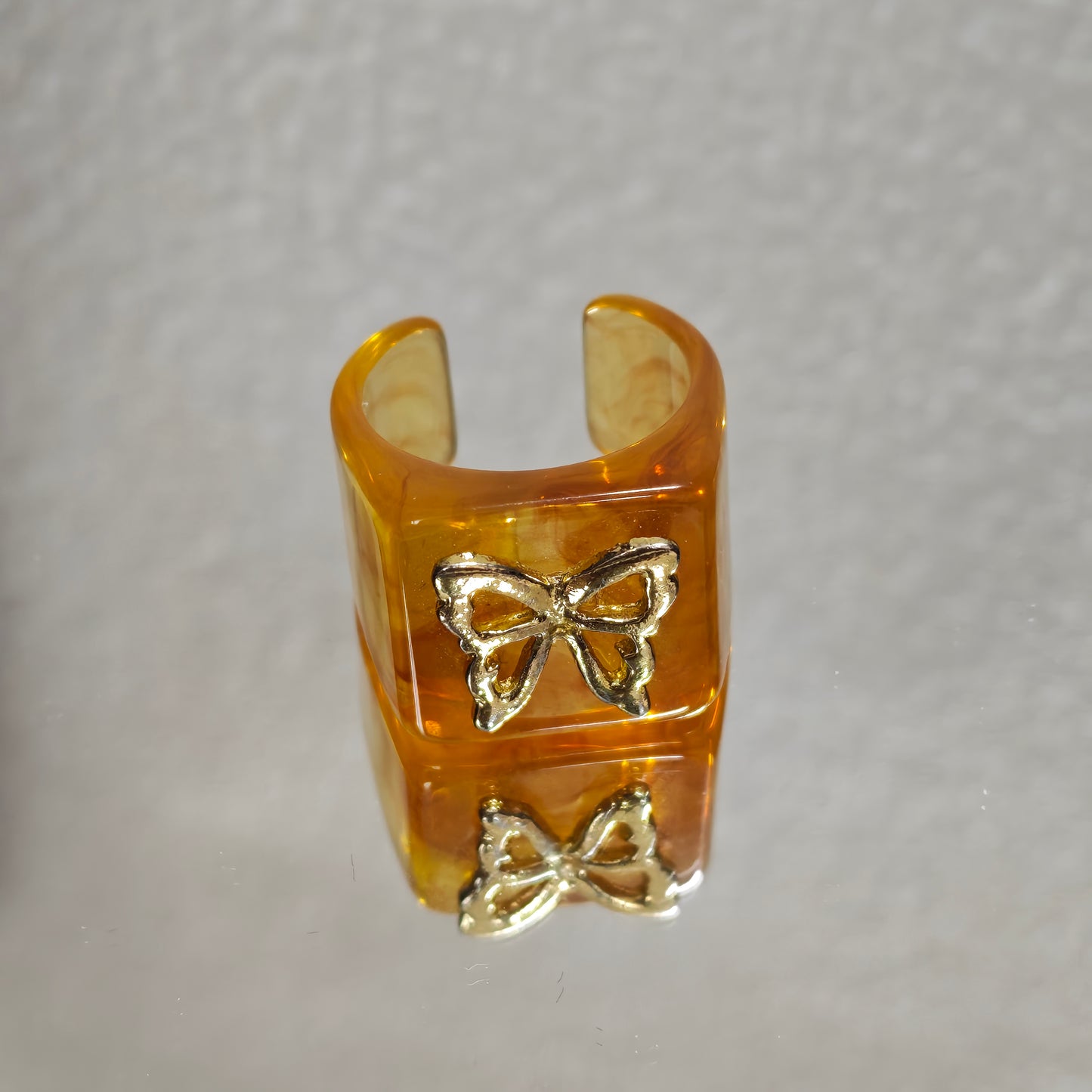 resin butterfly ring cottagecore warm tones