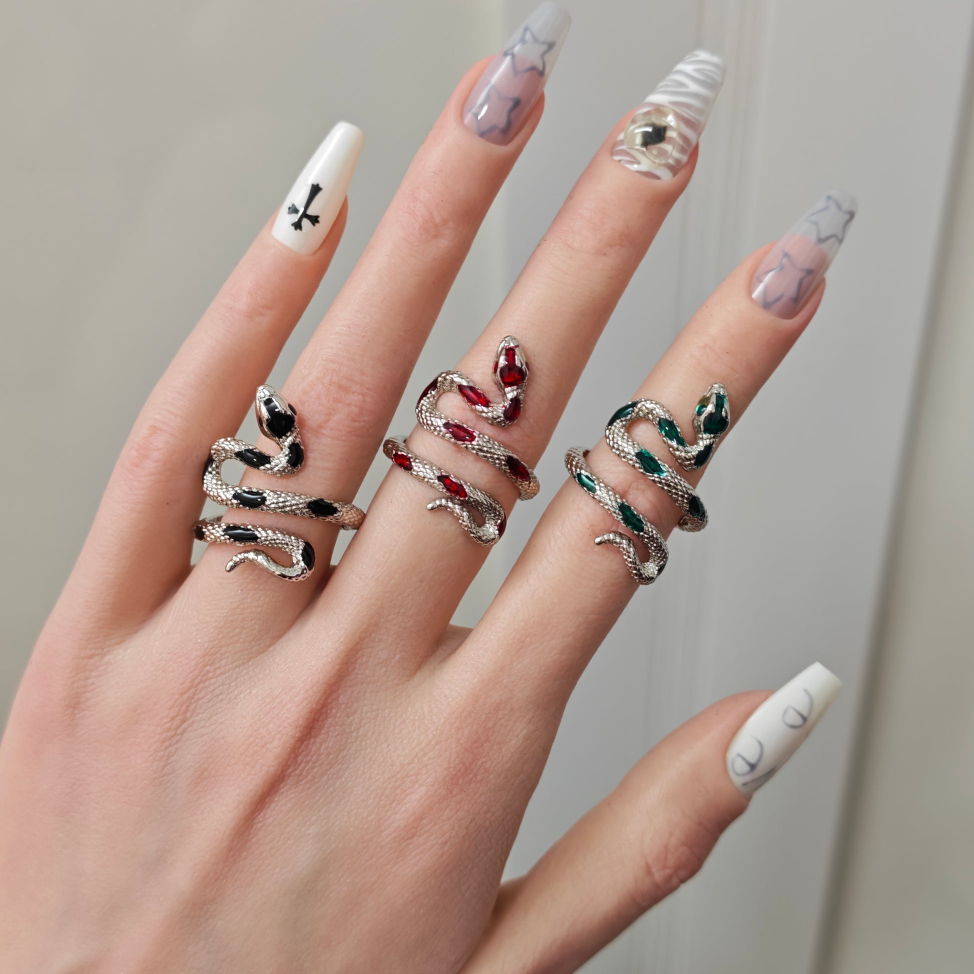 Coiled Snake Ring in open Aslop Jewelry white gift box, angled view