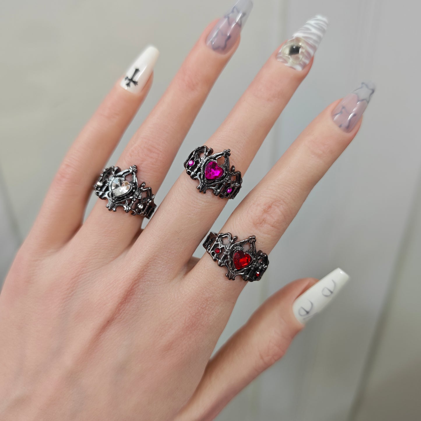 Gothic Heart Crown Ring in open black velvet jewelry box, angled view