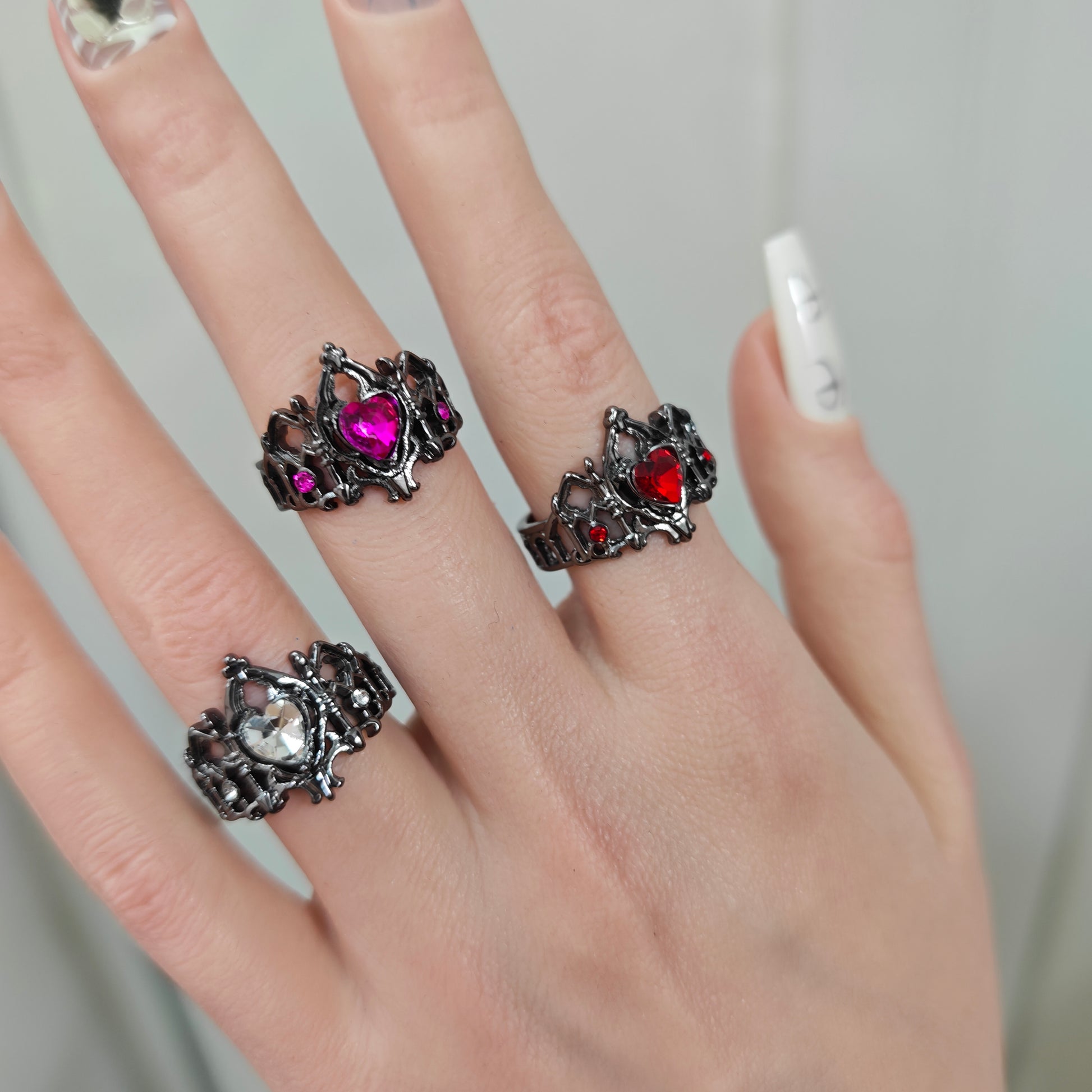 Gothic Heart Crown Ring in open black velvet jewelry box, overhead flat lay