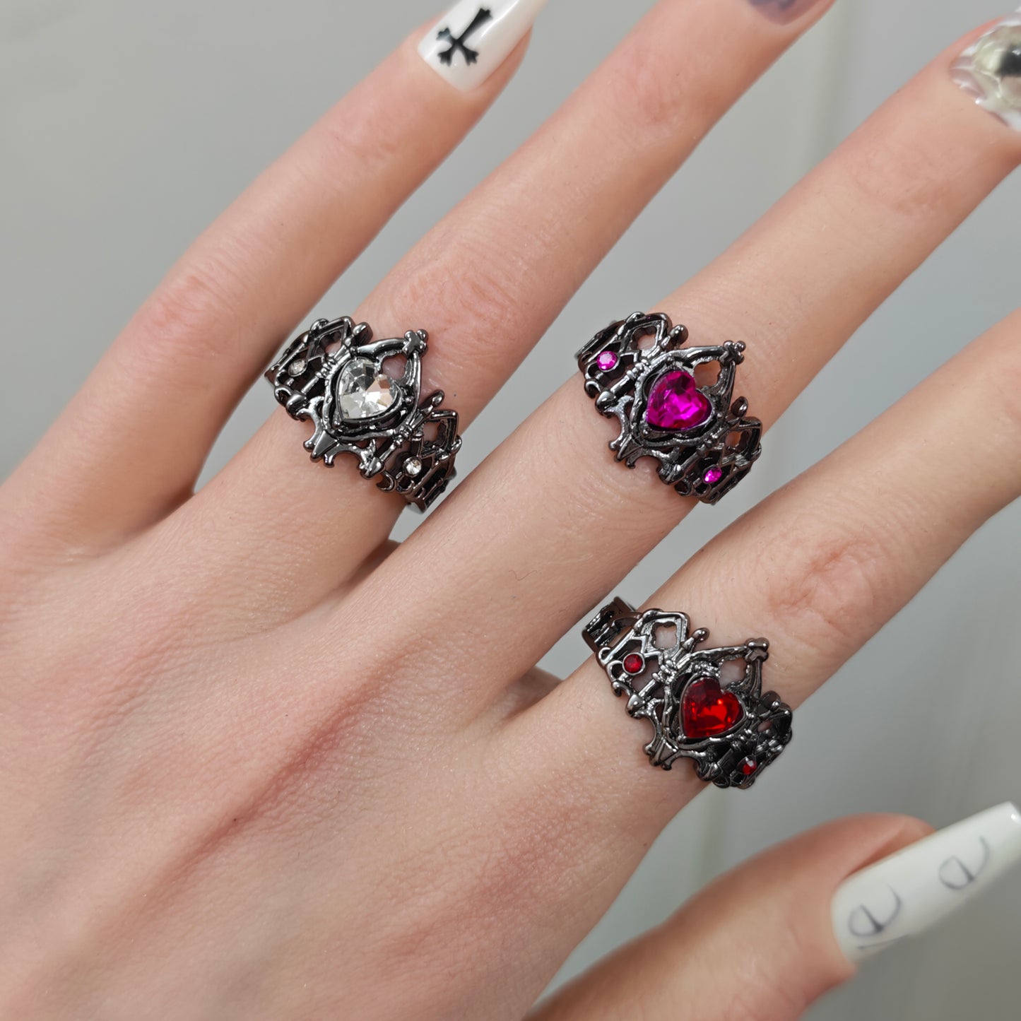 Gothic Heart Crown Ring on black mannequin hand, front view close-up