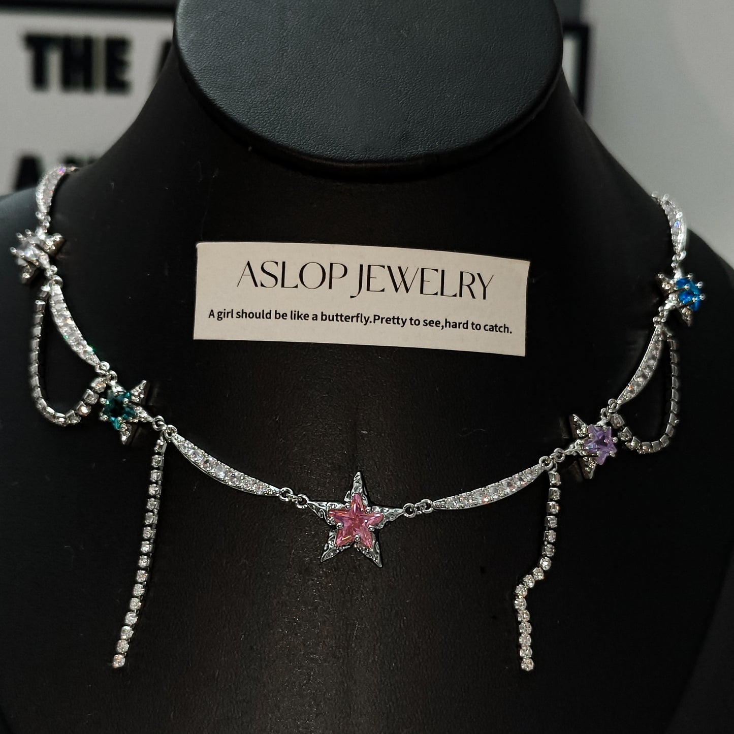 Y2K Star Rhinestone Choker Necklace - Fairy Grunge Jewelry in open black velvet jewelry box, overhead flat lay