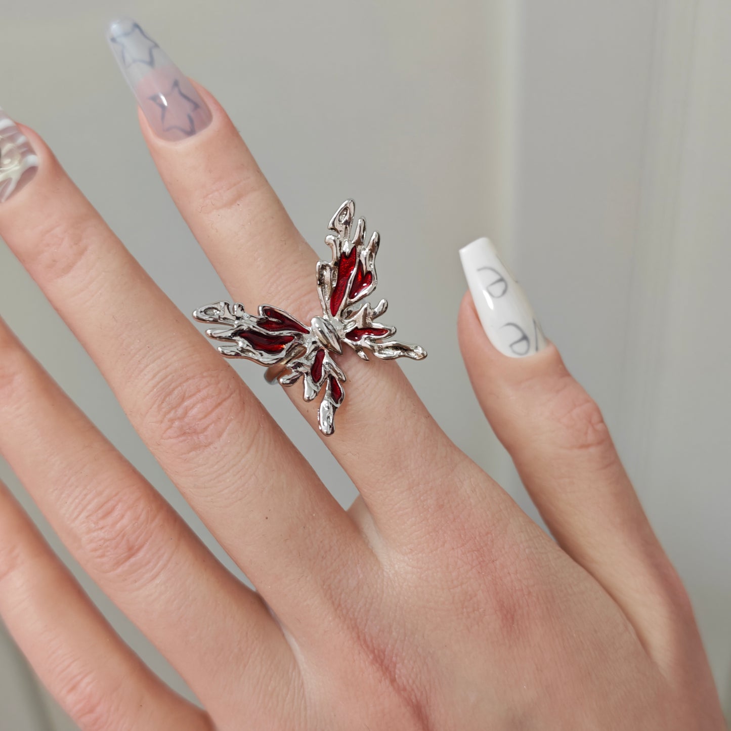 Red Enamel Butterfly Ring close-up detail view showing dark red finish