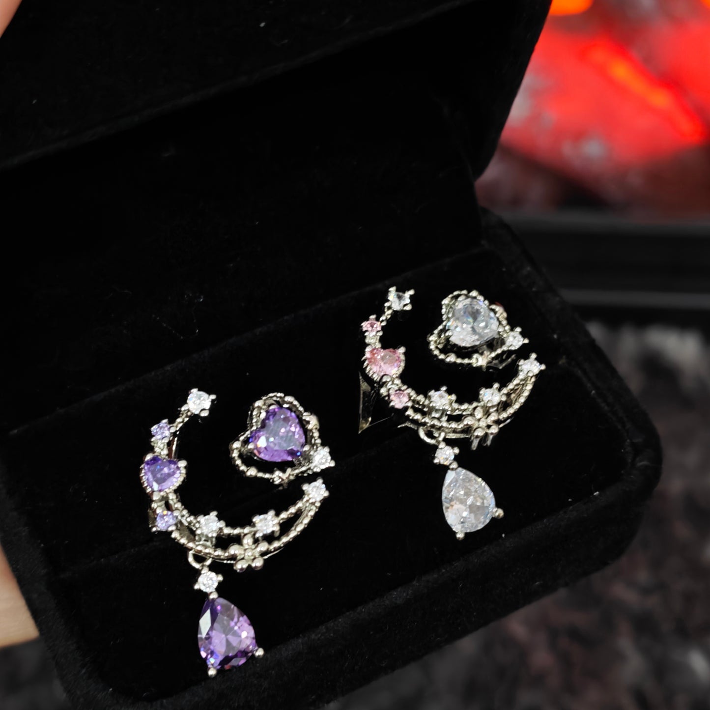 Heart Drop Chain Ring in open black velvet jewelry box, angled view