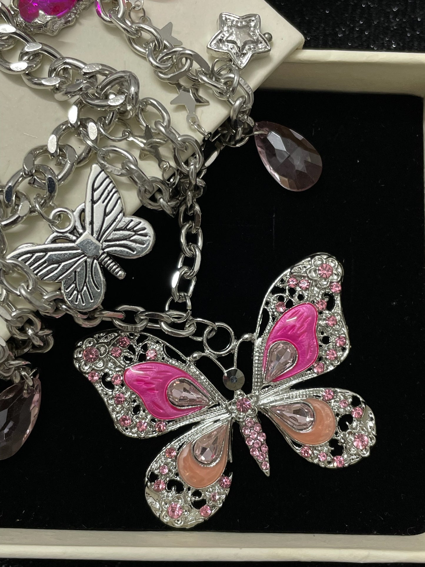 Pink Butterfly Charm Necklace close-up detail view showing silver red finish