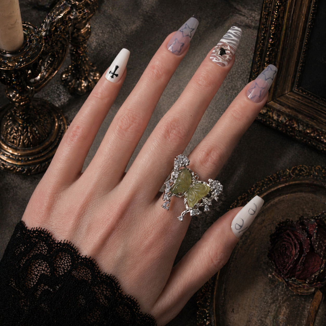 Green Carved Butterfly Ring worn on finger, dark moody background – Aslop Treasure