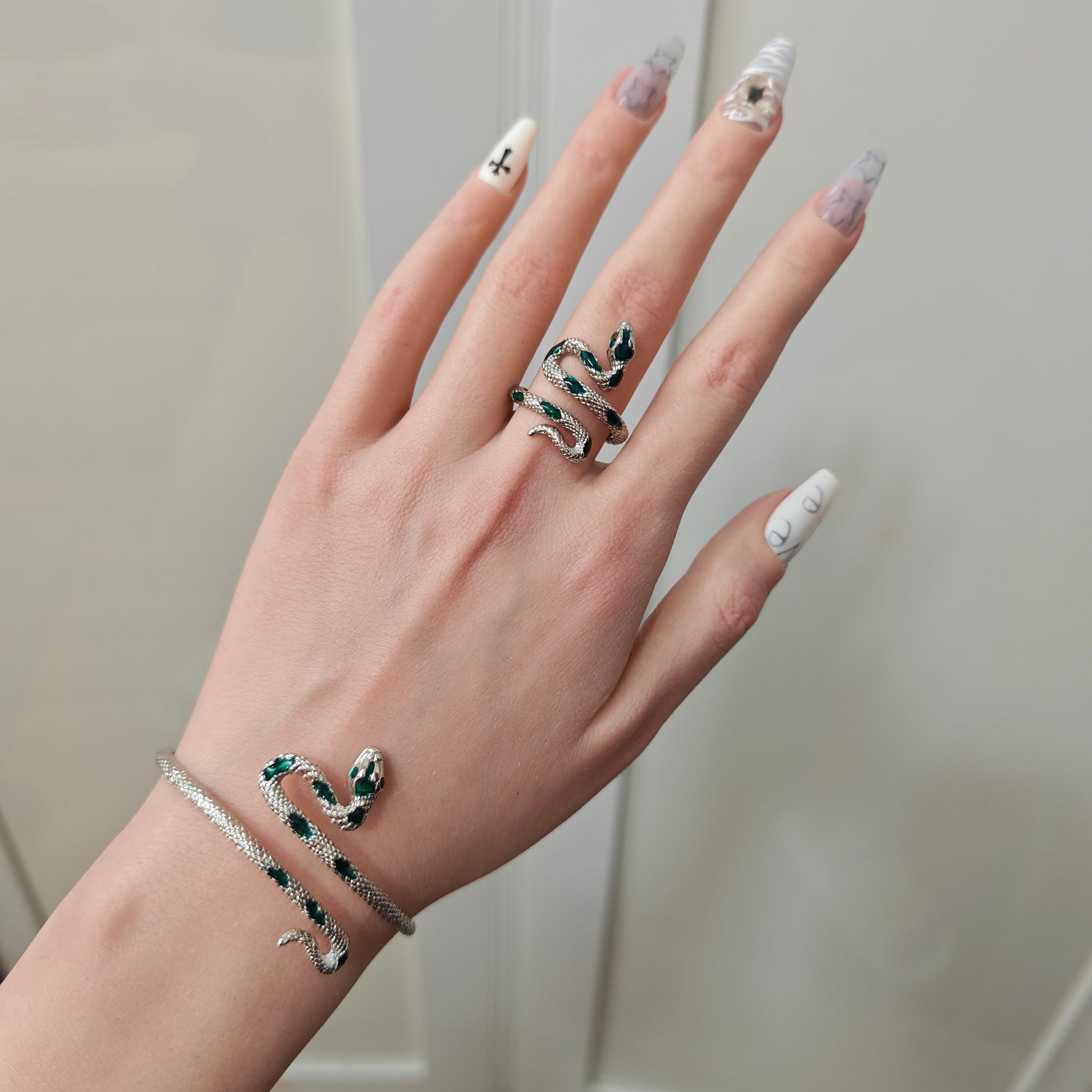 Green Snake Ring & Band Bracelet Set in open Aslop Jewelry white gift box, overhead flat view