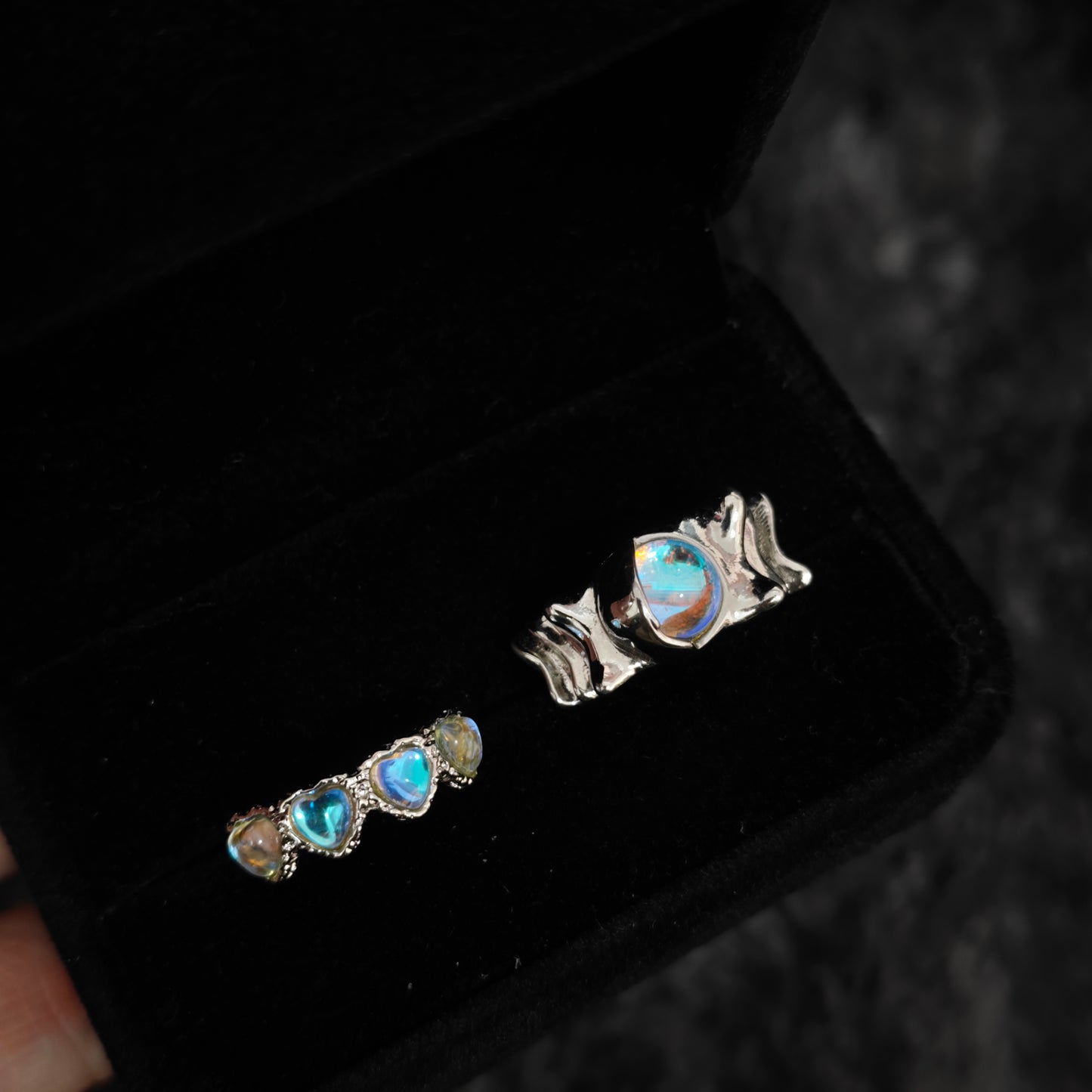 Moonlit Hearts Ring Set in open black velvet jewelry box, overhead flat lay
