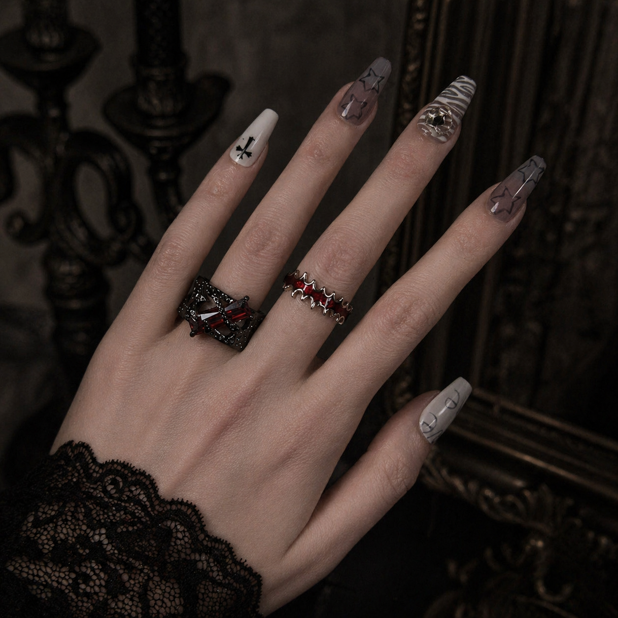 Gothic Red Stone Ring worn on finger, dark moody background – Aslop Treasure