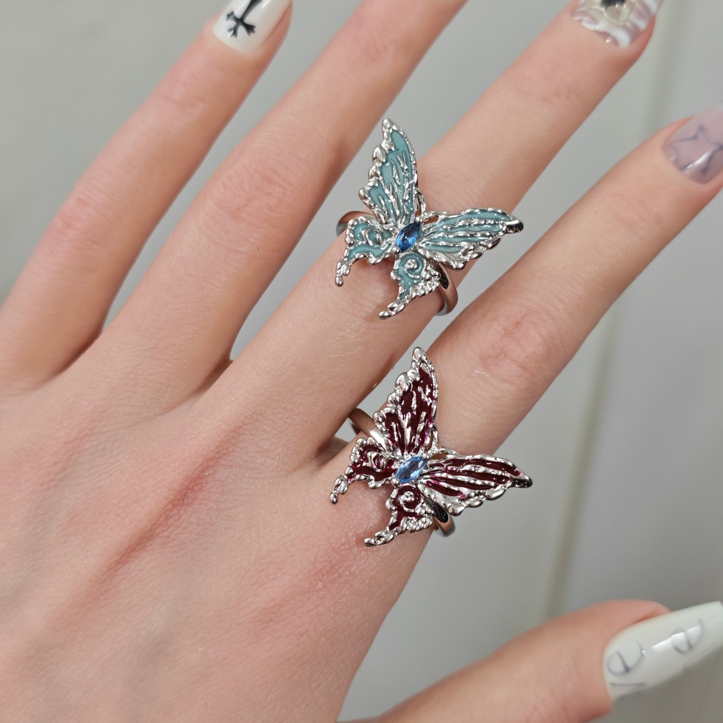 Red Enamel Butterfly Ring in open Aslop Jewelry white gift box, angled view
