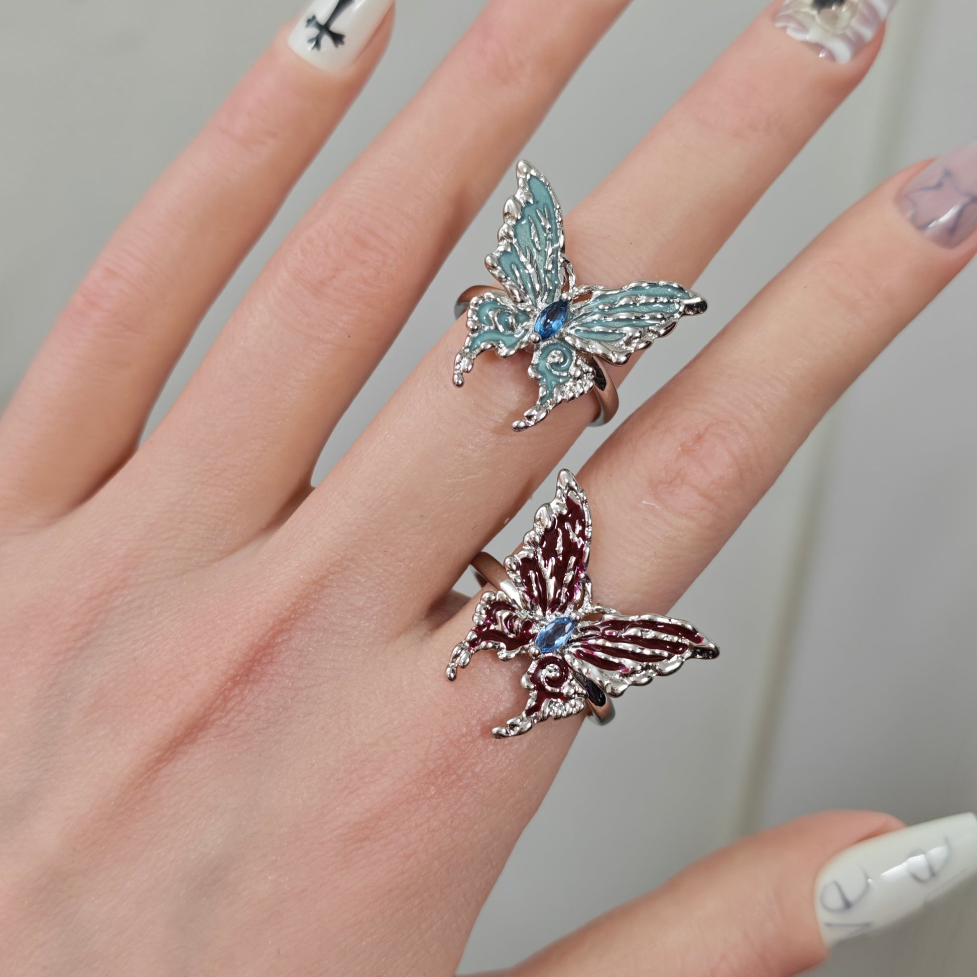 Red Enamel Butterfly Ring in open Aslop Jewelry white gift box, angled view