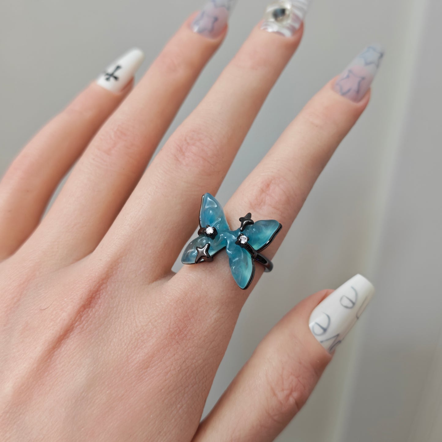 Blue Butterfly Resin Ring in open Aslop Jewelry white gift box, angled view