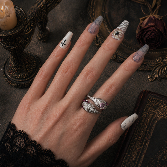 Pink Snake Ring worn on finger, dark moody background – Aslop Treasure