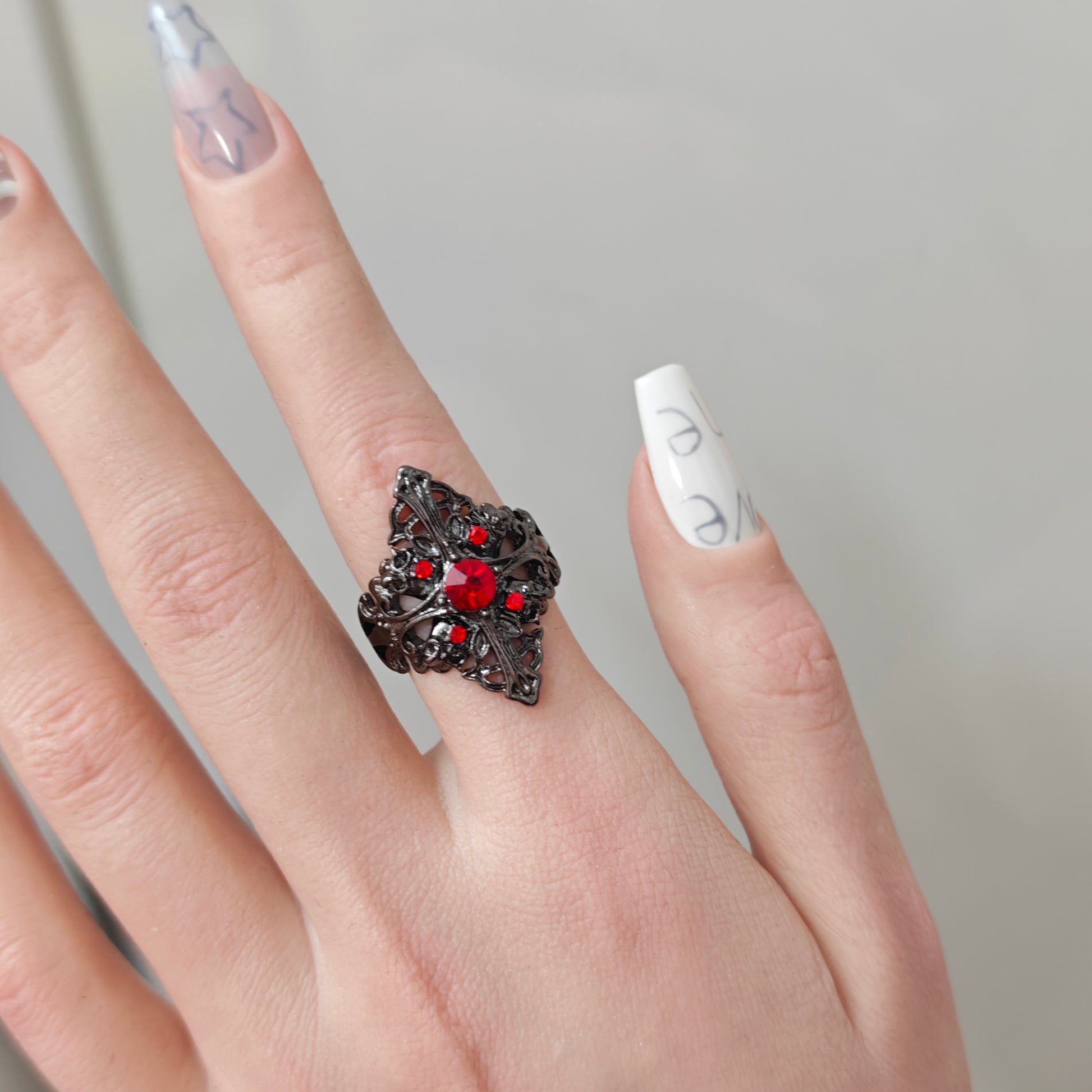 Gothic Red Ring in open Aslop Jewelry white gift box, angled view
