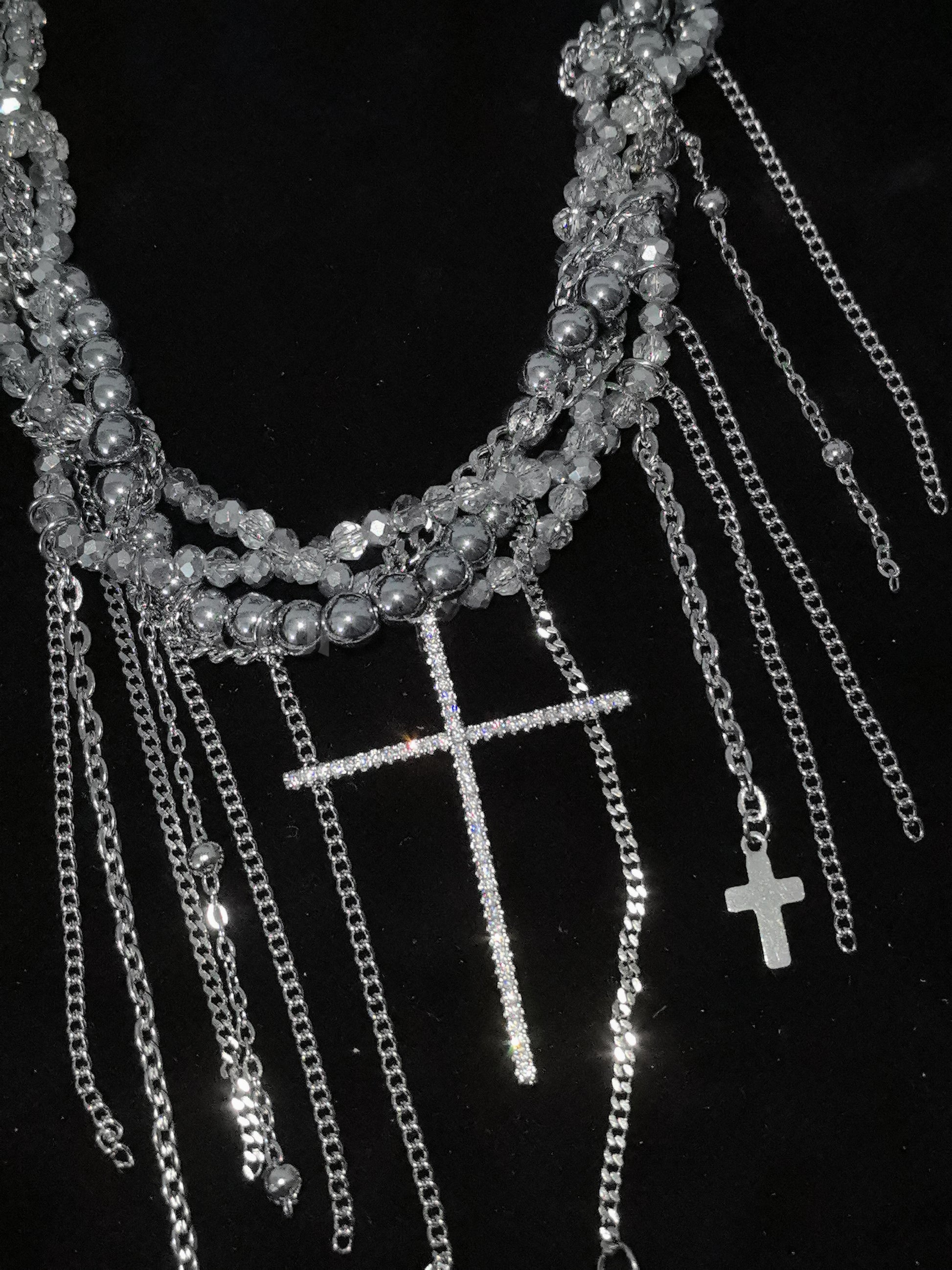 Crystal Cross Tassel Necklace close-up detail view showing silver finish