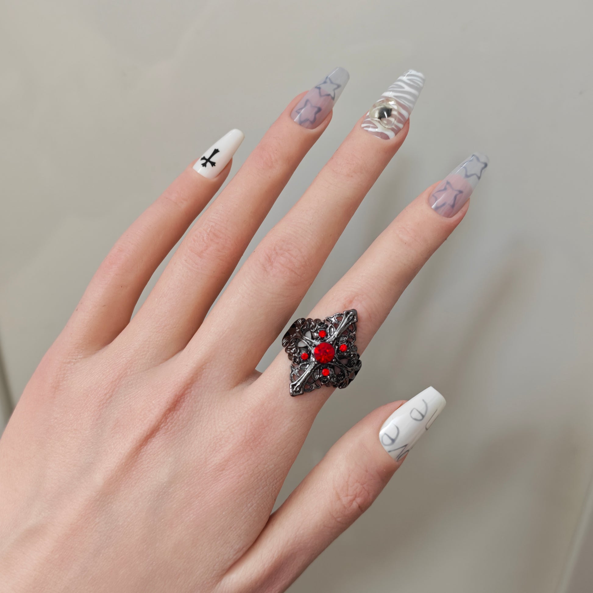 Gothic Red Ring in open Aslop Jewelry white gift box, overhead flat view