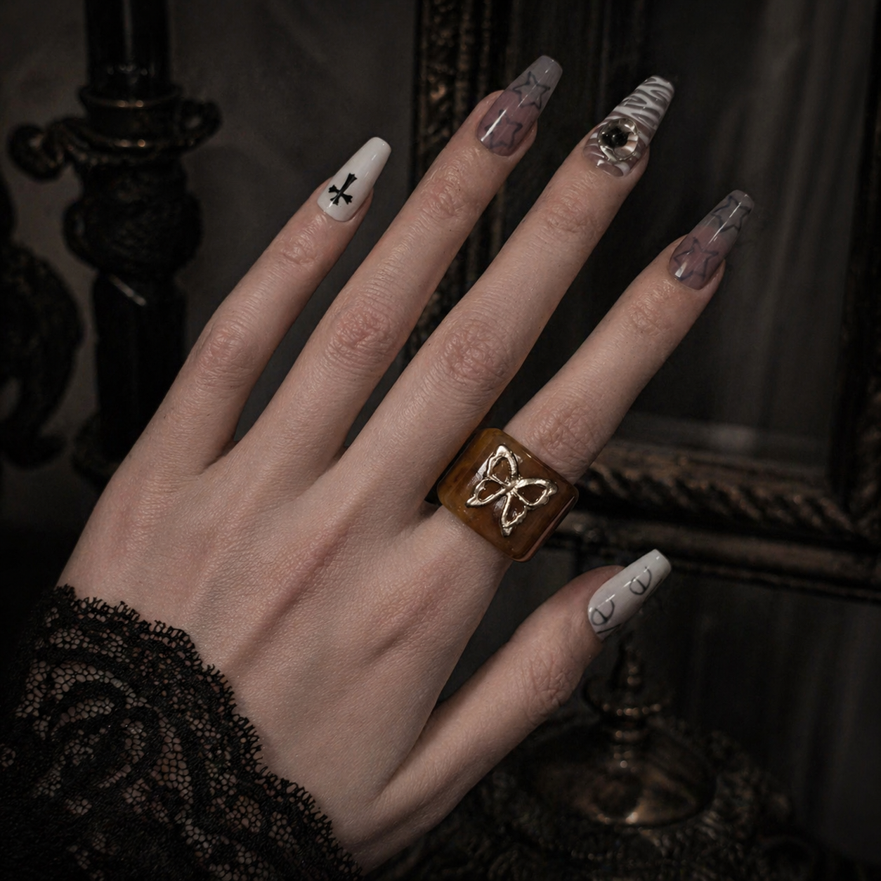 Amber Butterfly Resin Ring worn on finger, dark moody background – Aslop Treasure