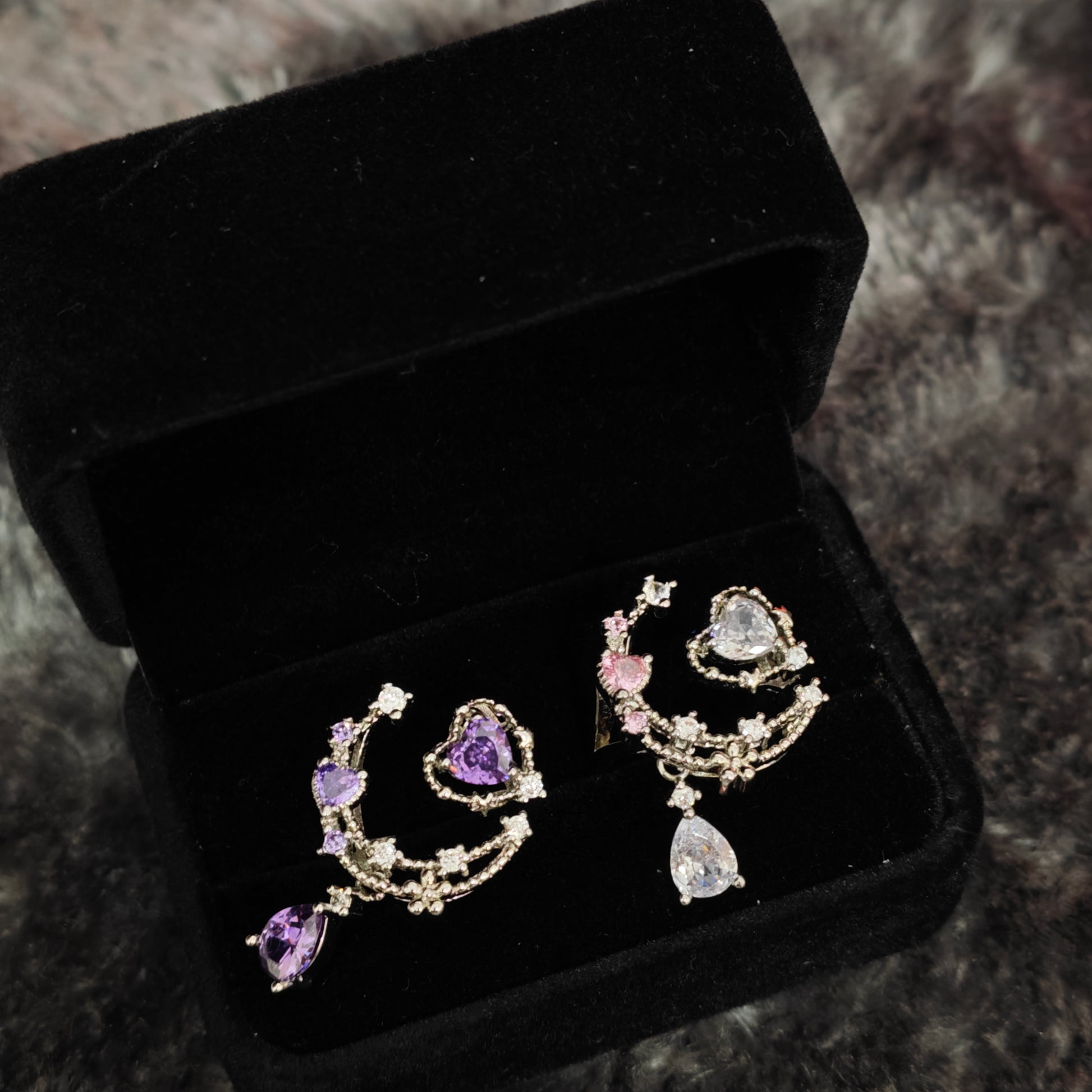 Heart Drop Chain Ring in open black velvet jewelry box, overhead flat lay