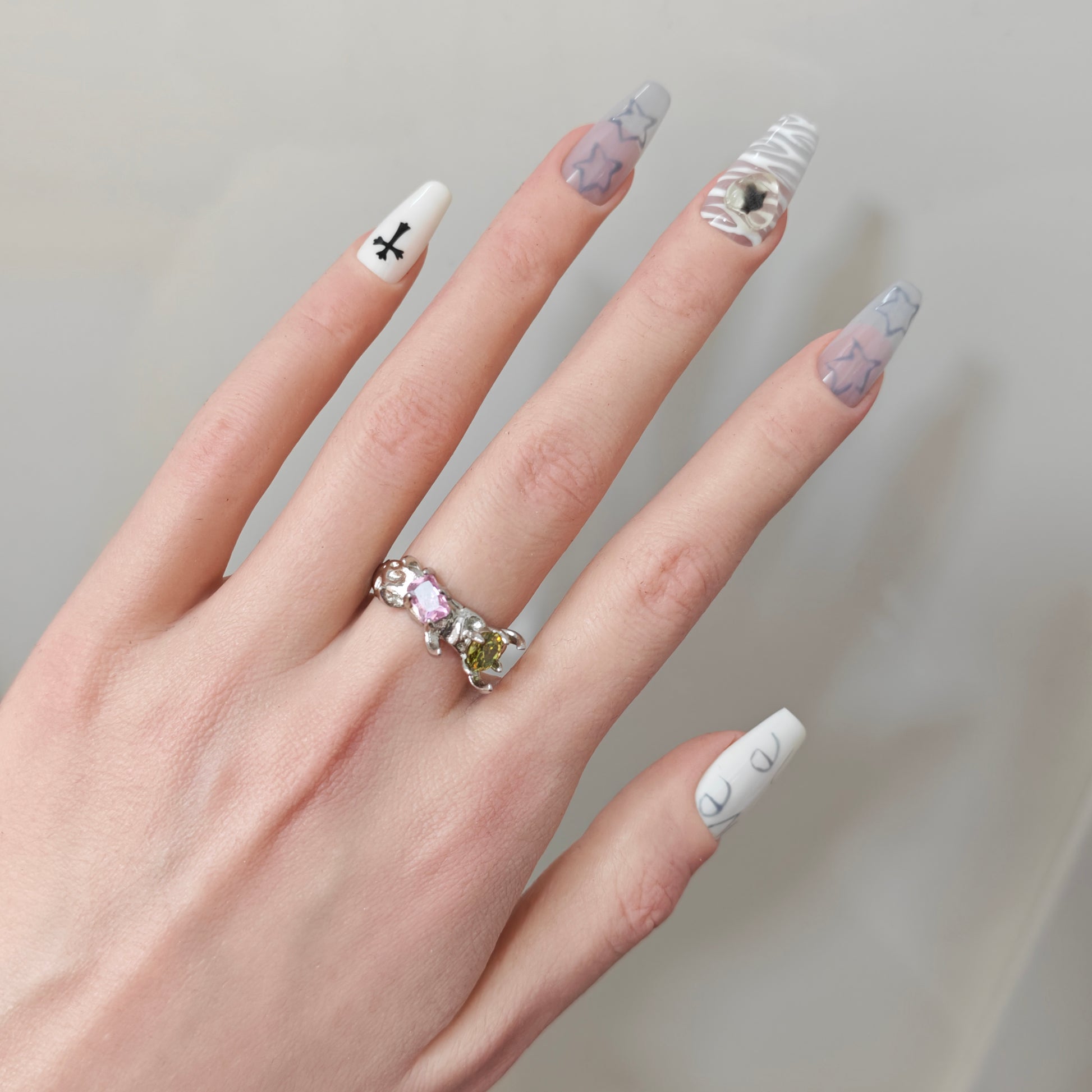 Colorful Zircon Claw Ring in open Aslop Jewelry white gift box, angled view