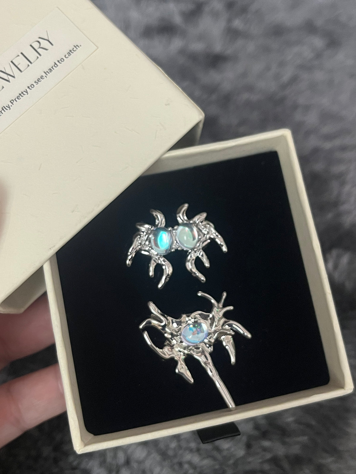 Moonstone spider ring set open box angled view, gothic silver statement rings